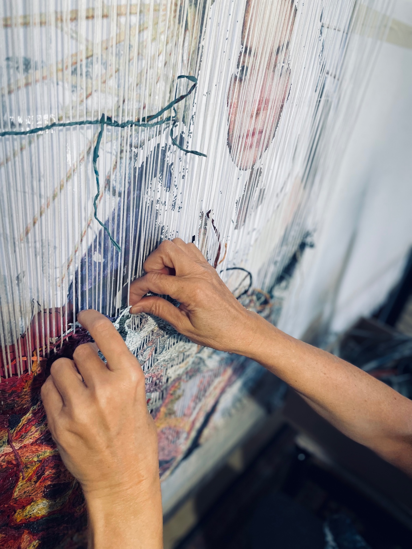 Hands at the loom